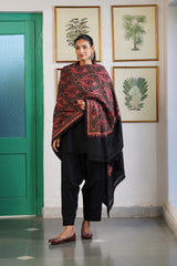 Black wool shawl draped over shoulder, Kashmiri craftsmanship