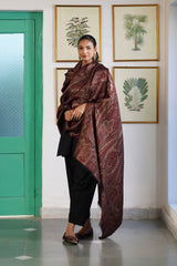 Bronze shawl draped over shoulder, wedding gifting choice