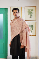 Pink embroidered shawl draped over shoulder for bridal look
