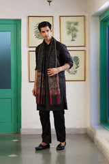 Black woven stole folded neatly, men's winter gifting essential