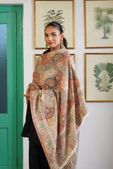 Deep red jacquard shawl draped over shoulder for wedding