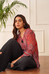 Red Printed Top with Black Pleated Pants