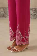 Close-up of cutwork embroidery in paisley and floral pattern on pant hem
