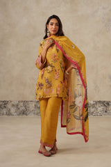 Woman wearing yellow floral printed co-ord set with dupatta
