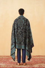 Man wearing navy Jamawar wool shawl for festive gifting