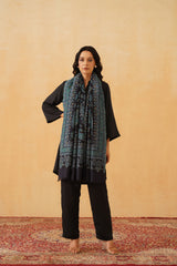 Navy blue wool shawl draped over shoulder, festive gift for her