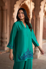 Jashn Emerald Cutwork Embroidered Co-ord Set, emerald modal tunic with dark blue cutwork embroidery and harem pants, image 2 of 5