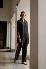 Black Top with Floral Embroidered Pants