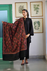 Close-up of black multicolor paisley embroidery on Kashmiri shawl