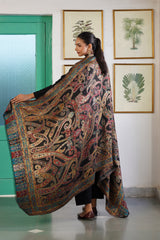 Jewel tone Kani paisley shawl draped elegantly for a wedding gift