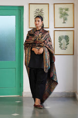 Paisley woven shawl draped over shoulder for wedding function