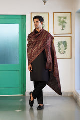 Bronze paisley shawl styled elegantly as a luxury gift