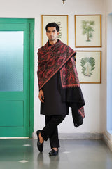 Woman styled in fine embroidered Kashmiri wool shawl