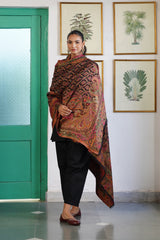 Vibrant multicolor paisley detail on floral festive shawl
