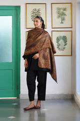Gold black Kaani stole folded to reveal reversible jacquard pattern