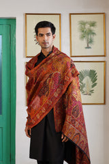 Woman styled in beige jacquard shawl for wedding gifting