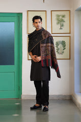 Man draped in black woven stole, ideal winter gift for him