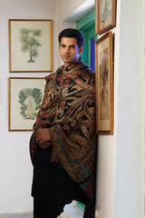 Jewel tone paisley shawl styled for wedding celebration