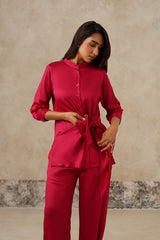 Detail of wrap tie waist on rani pink satin shirt
