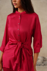 Detail of wrap tie waist on rani pink satin shirt
