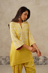 Woman wearing yellow Aari embroidered farshi salwar set for haldi with ombre dupatta SLEEVES