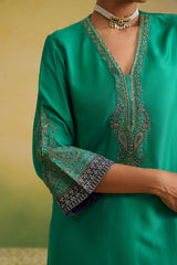 Detail of embroidered sleeve cuff on emerald green kurta