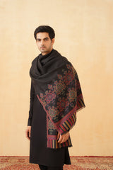 Black wool shawl folded neatly, a classic gift for groom