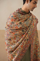 Beige Kani pashmina shawl draped over shoulder, elegant gift