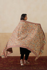 Beige pashmina shawl styled elegantly for wedding gifting